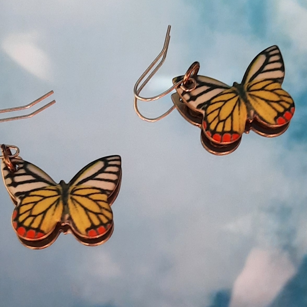 Yellow/white butterfly dangle earrings